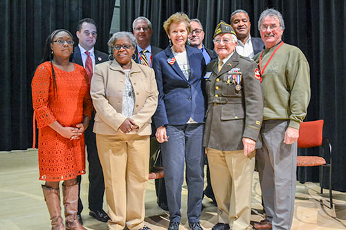 photo of Senator Moore with veterans
