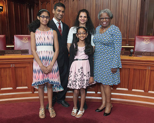 photo of Senator Moore and and the Gosukonda family.