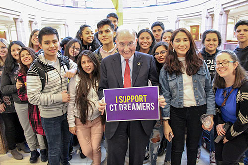 photo of Senator Looney with Dreamers.
